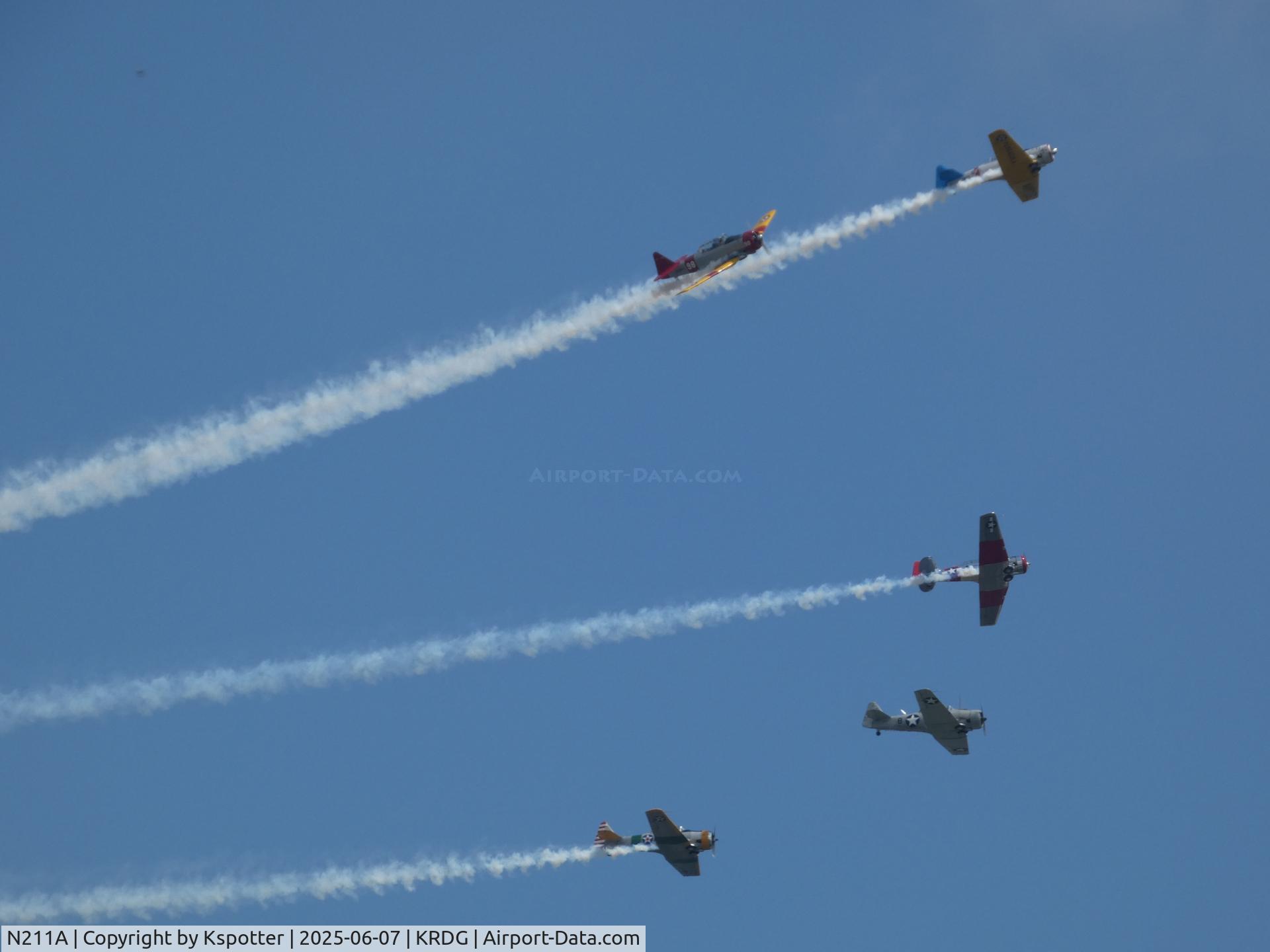 N211A, 1958 North American SNJ-6 Texan C/N 121-42318, Top right, blue & yellow Texan