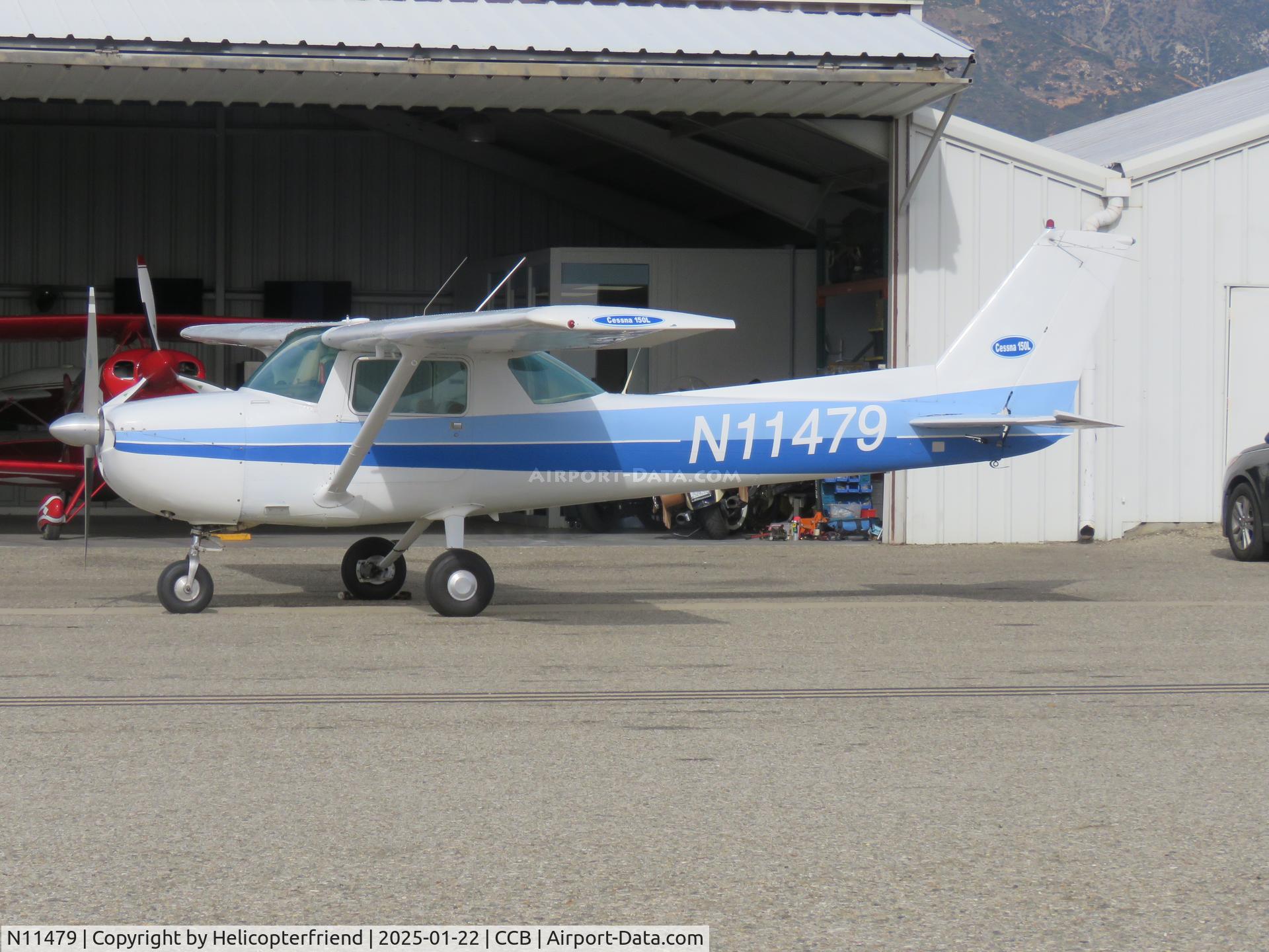 N11479, 1973 Cessna 150L C/N 15075450, Parked near hangers