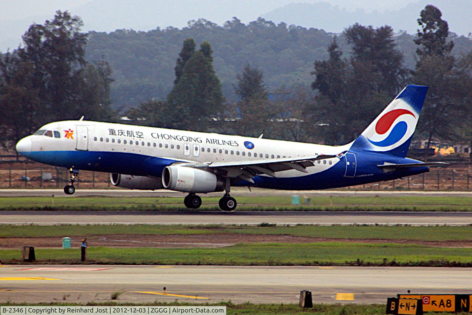 B-2346, 1997 Airbus A320-232 C/N 0704, 1997-build A320 of Chongqing Airlines at Guangzhou Airport, China