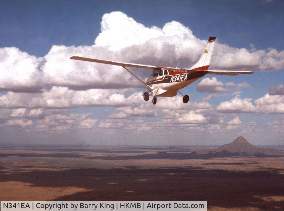 N341EA, Cessna U206F Stationair C/N U20602962, Here is this aircraft in flight over northern Kenya in 1975. Flown by Mike Grennel