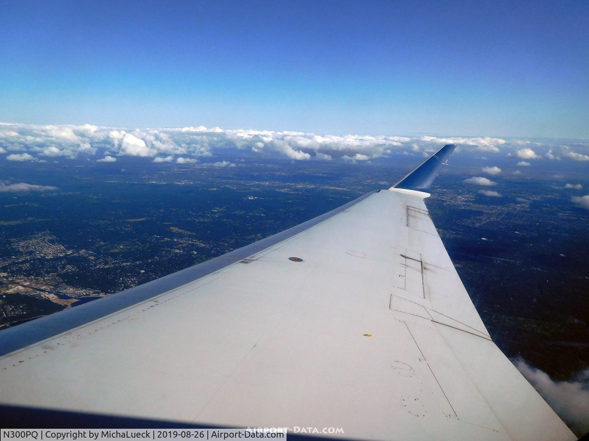 N300PQ, 2013 Bombardier CRJ-900LR (CL-600-2D24) C/N 15300, Climbing out of Montreal (YUL-LGA)