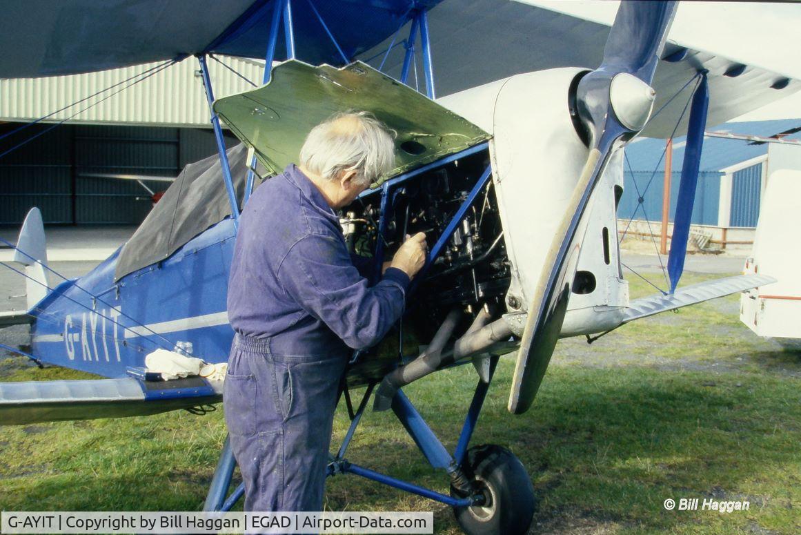G-AYIT, 1941 De Havilland DH-82A Tiger Moth II C/N 86343, G-AYIT undergoing maintenance at Newtownards airfield, home of the Ulster Flying Club, back in the 1990's.