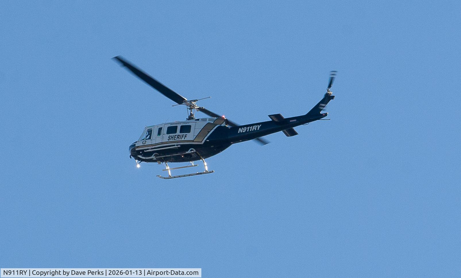 N911RY, Bell UH-1H C/N 66-16137, Near Sacramento River, California