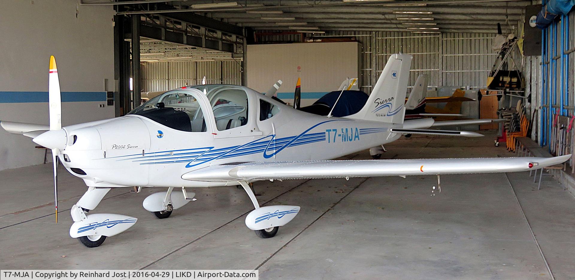 T7-MJA, Tecnam P2002 Sierra C/N 426, P2002 in a hangar at Aviosuperficie Torraccia, San Marino's only airfield