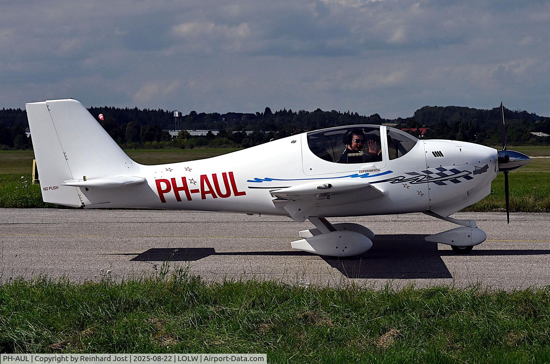 PH-AUL, 2008 Europa XS Tri-gear C/N 591, With a friendly cö-pilot at Rotax Days, Wels, Austria