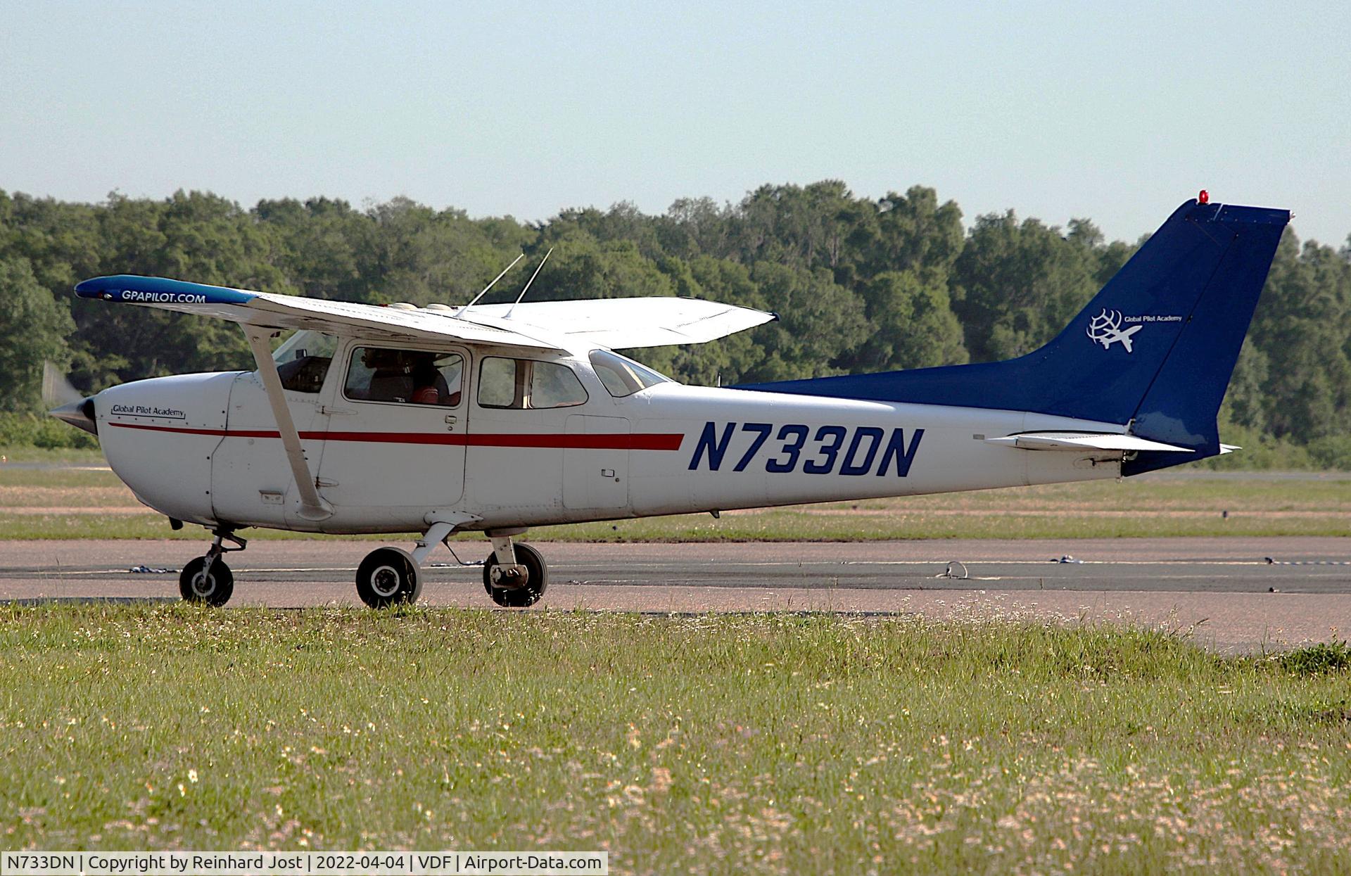 N733DN, 1976 Cessna 172N C/N 17268216, Cessna 172N of Global Pilot Academy taxies to the next circles at Tampa Executive, FL