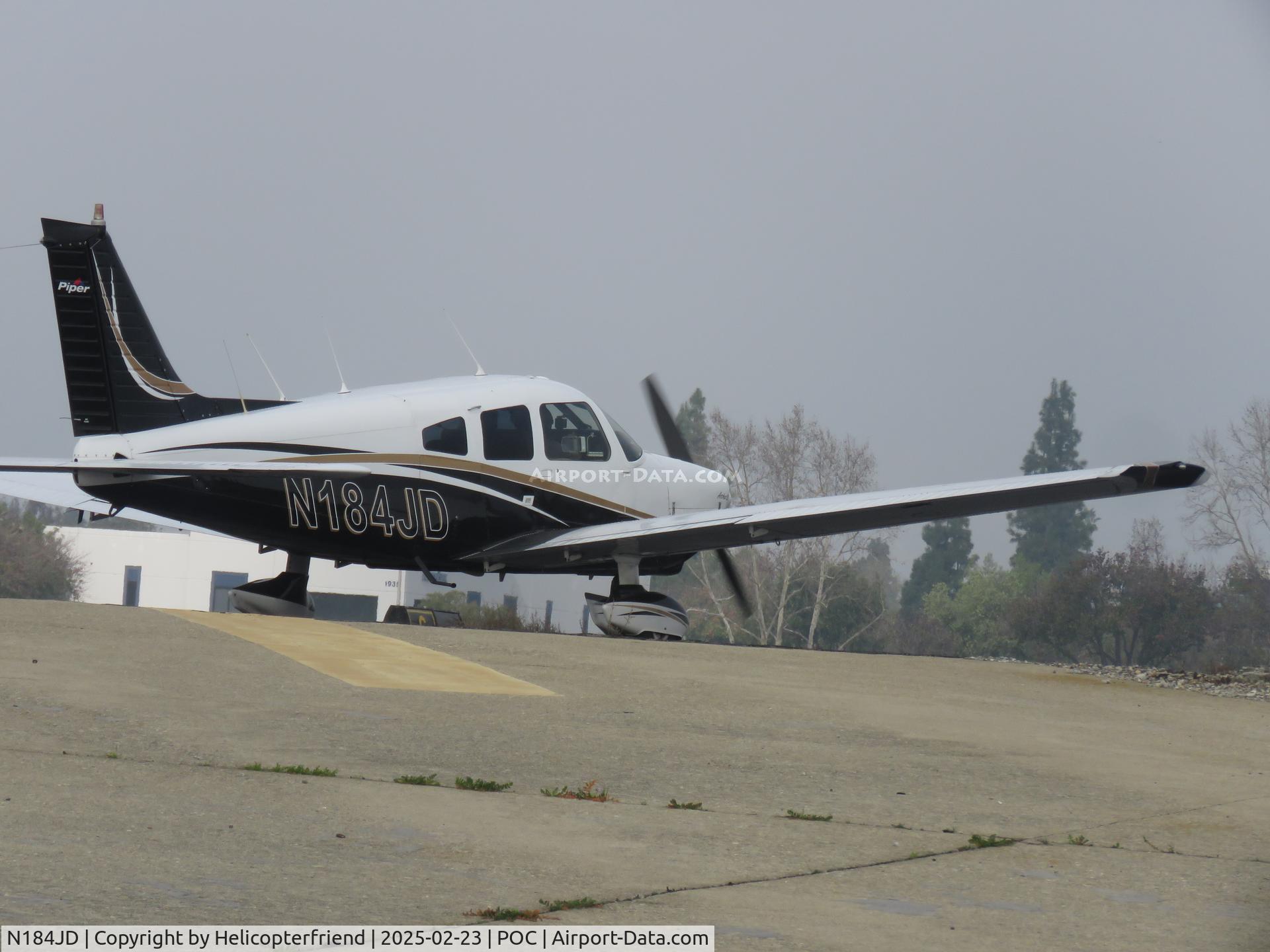 N184JD, 1977 Piper PA-28-181 C/N 28-7790567, Holding short runway 26L