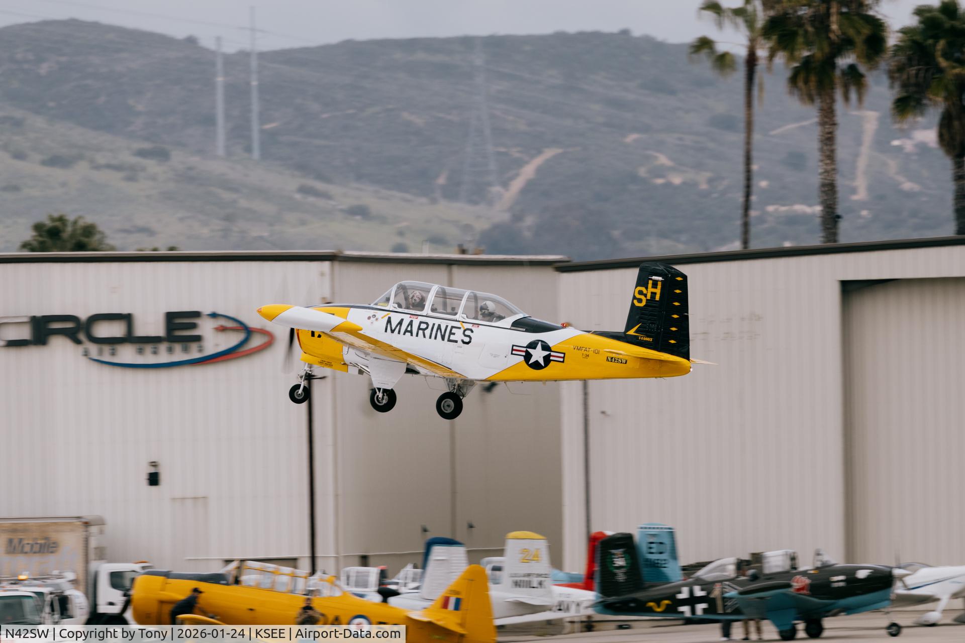 N42SW, 1957 Beech T-34B C/N BG-310, N42SW Departing KSEE 27R during a formation clinic
