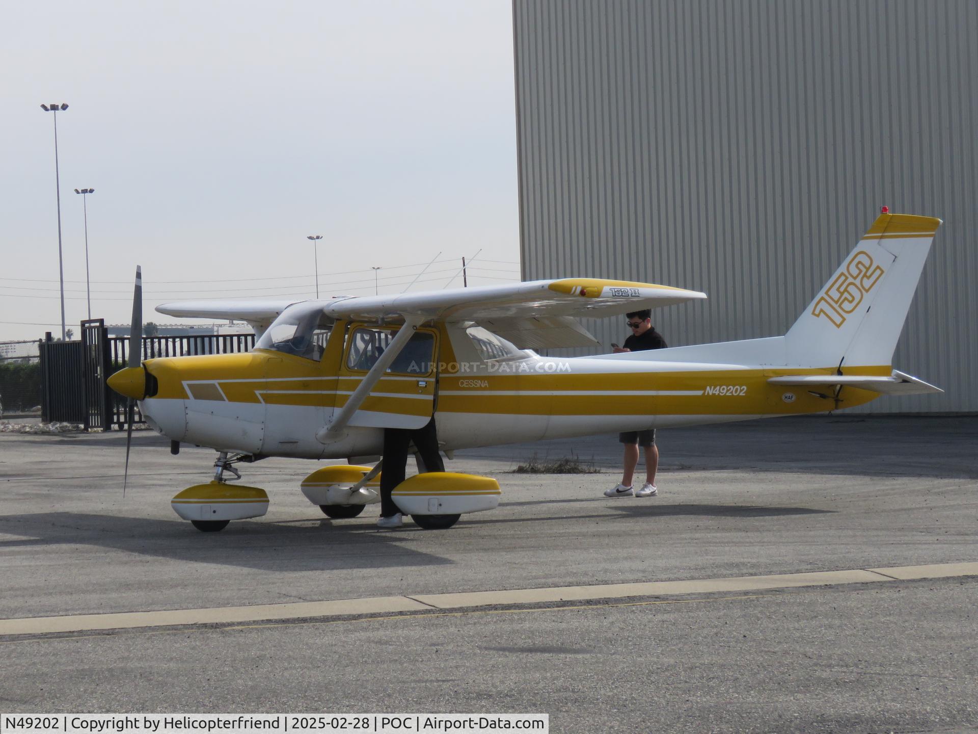 N49202, 1977 Cessna 152 C/N 15281191, Preparing to go flying
