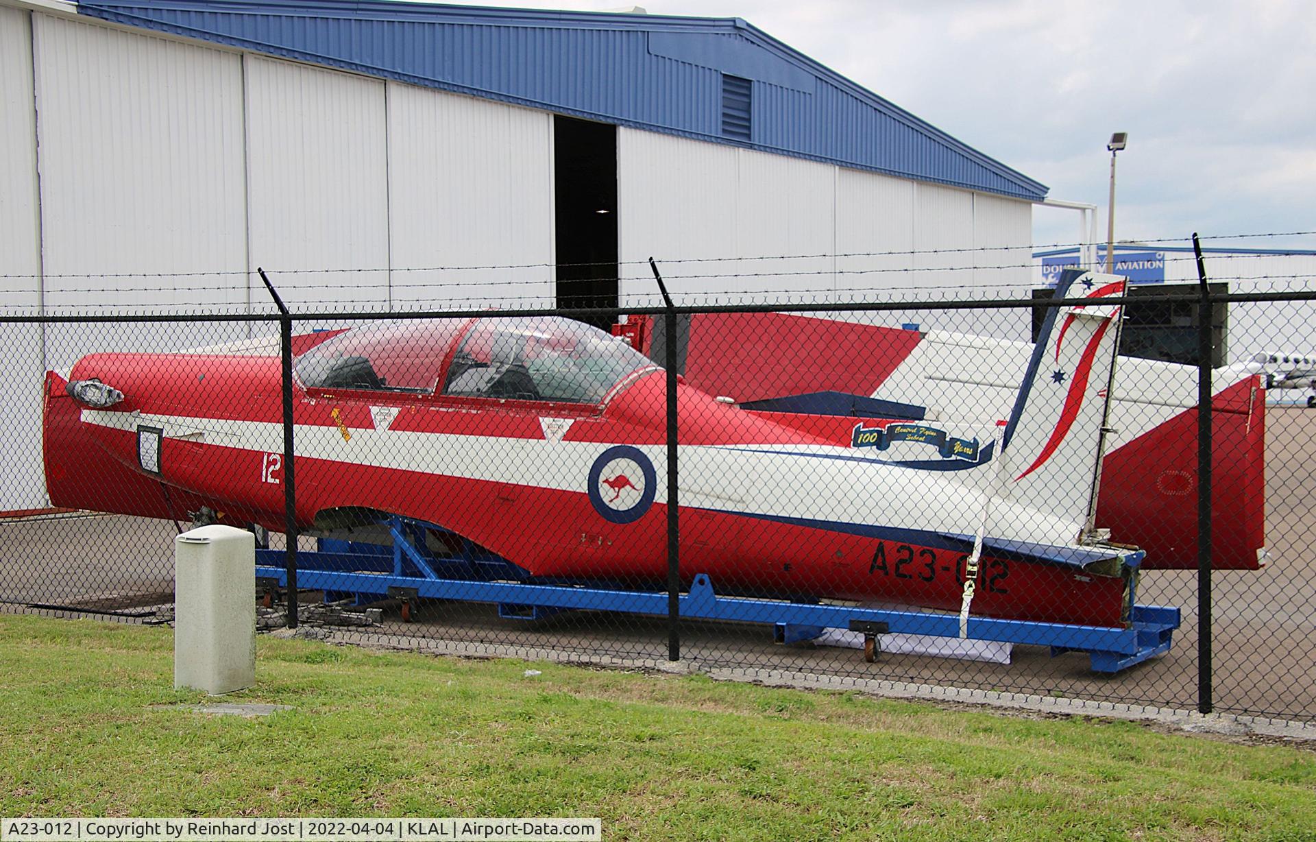 A23-012, 1989 Pilatus PC-9A C/N 512, A23-012 in parts on a silent corner at Lakeland Linder Airport, FL