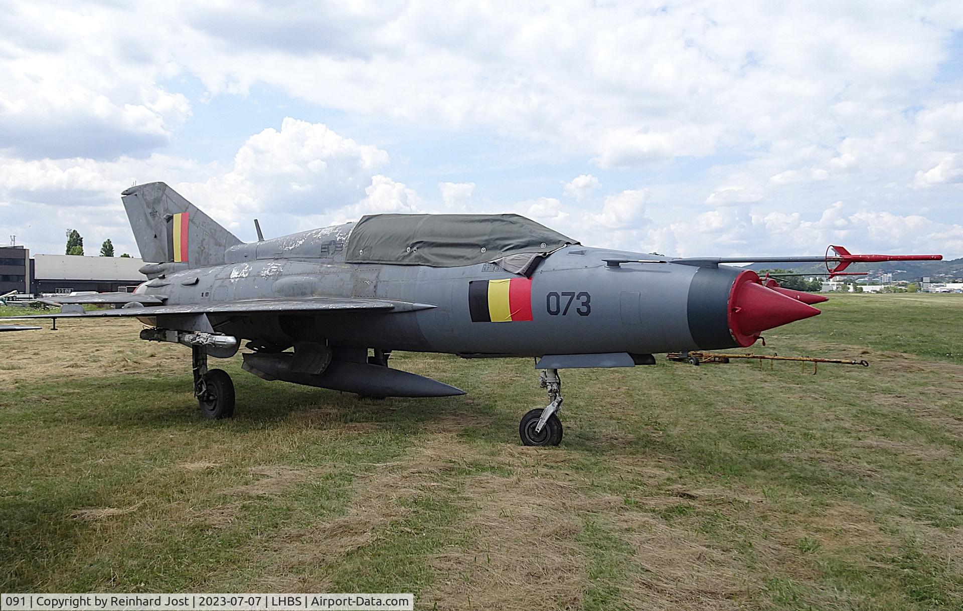 091, Mikoyan-Gurevich MiG-21UM C/N 516955091, With fake USAF reg 04-073 from a movie project and Belgian flag decals at Budaoers (LHBS), Hungary