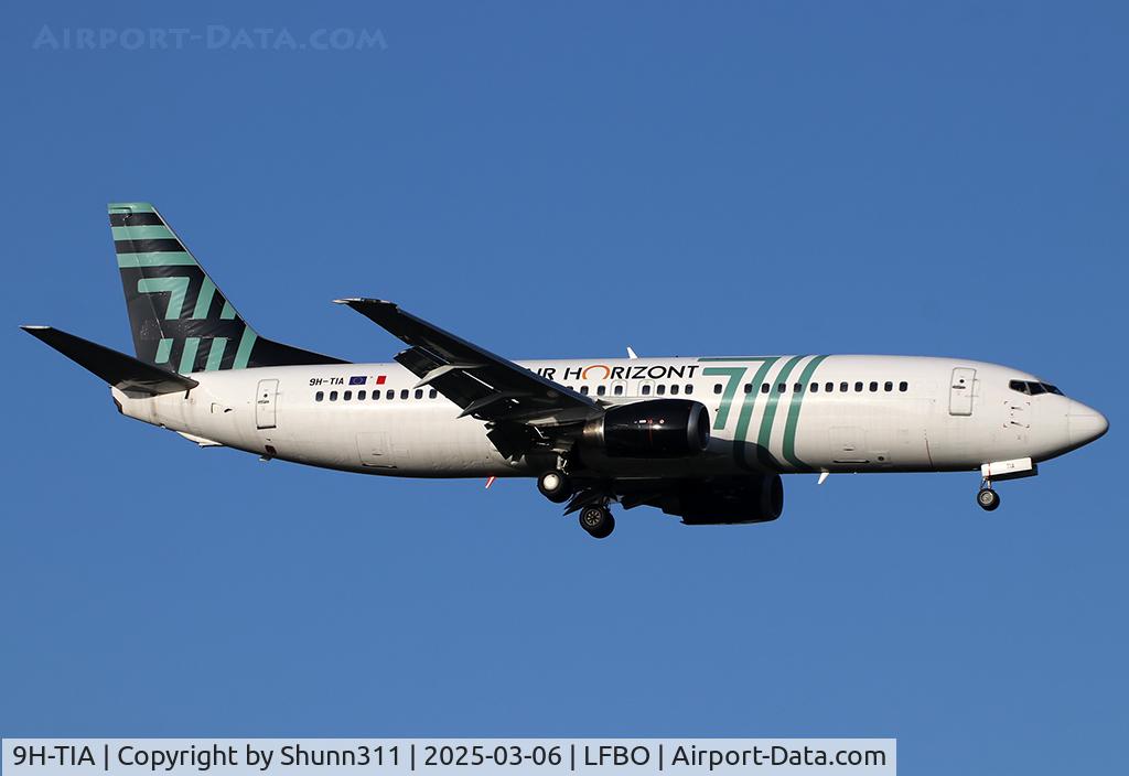 9H-TIA, 1992 Boeing 737-430 C/N 27007, Landing rwy 14R... Basic Air Seven c/s with additional titles...