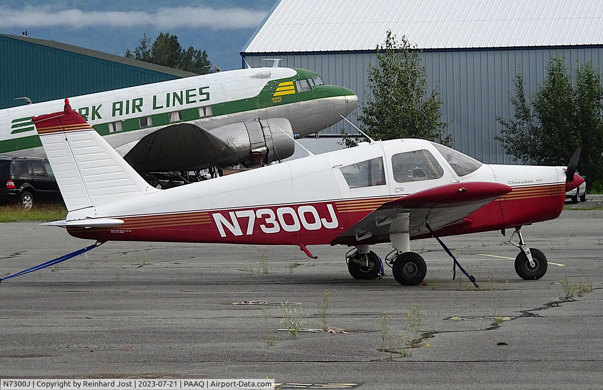 N7300J, 1968 Piper PA-28-140 C/N 28-24655, Cherokee N7300J in front of DC-3 N763A at Palmer Municipal