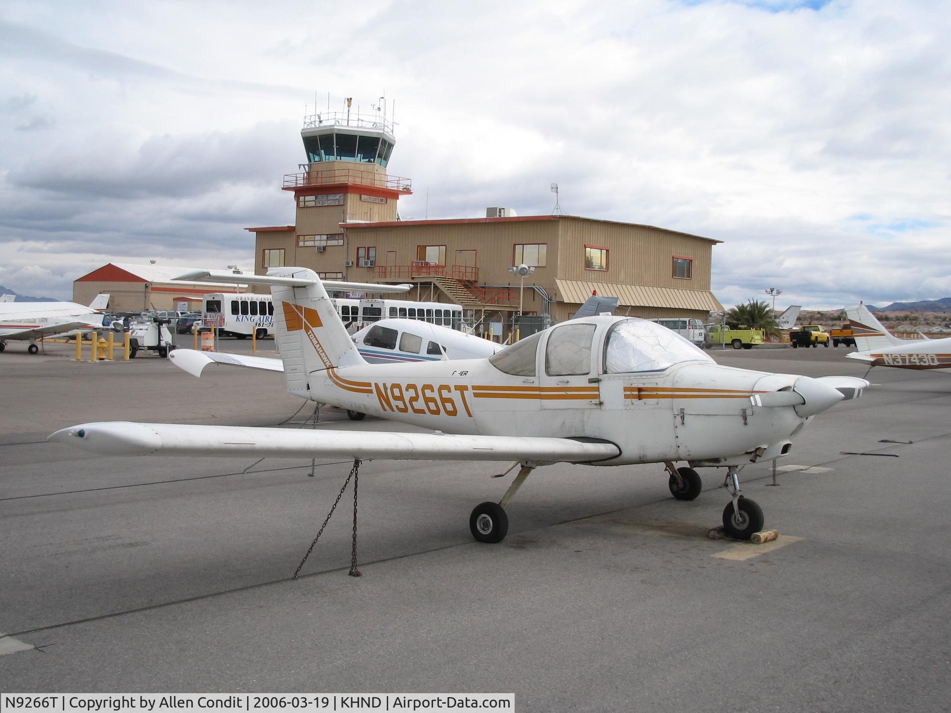 N9266T, 1978 Piper PA-38-112 Tomahawk C/N 38-78A0306, Piper Tomahawk N9266T on the ramp at Henderson, NV with the old short control tower.