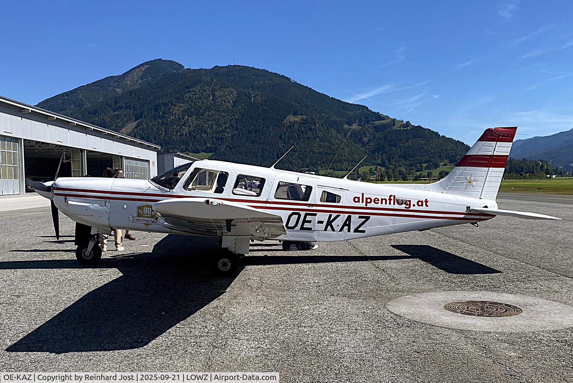 OE-KAZ, 1988 Piper PA-32-301 Saratoga C/N 3206044, OE-KAZ of Alpenflug with a 60-Years-of-Alpenflug sticker and an edelweiss on the tail at Zell am See (LOWZ), Austria