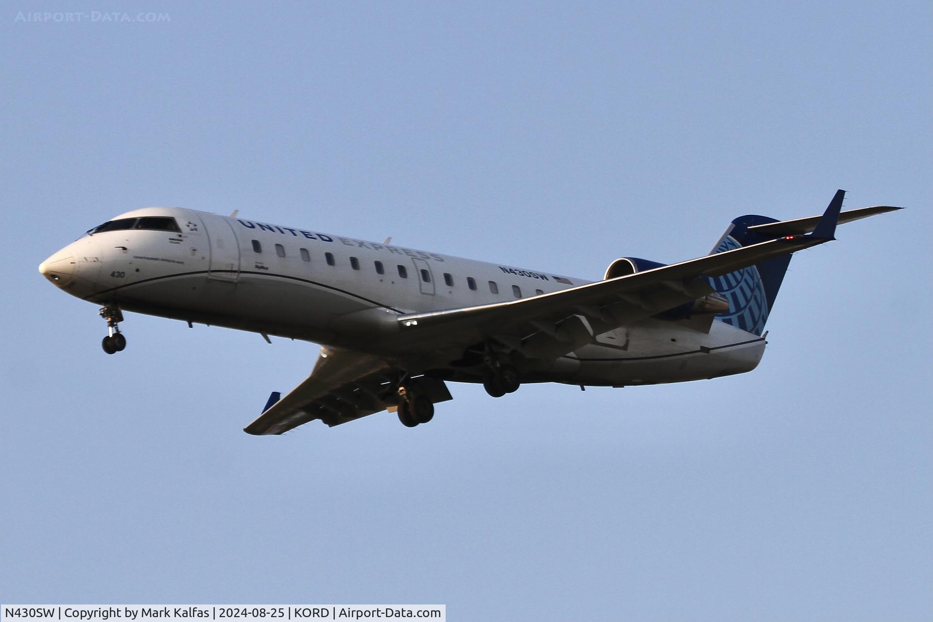 N430SW, 2001 Bombardier CRJ-200LR (CL-600-2B19) C/N 7523, CRJ2 SkyWest / United Express  Bombardier CRJ-200LR N439SW arriving 28C ORD