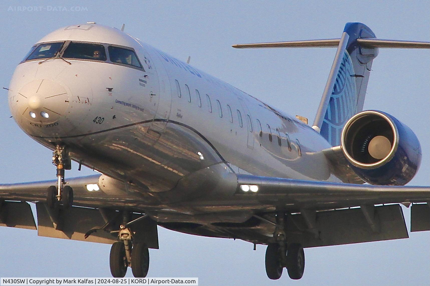 N430SW, 2001 Bombardier CRJ-200LR (CL-600-2B19) C/N 7523, CRJ2 SkyWest / United Express  Bombardier CRJ-200LR N439SW arriving 28C ORD
