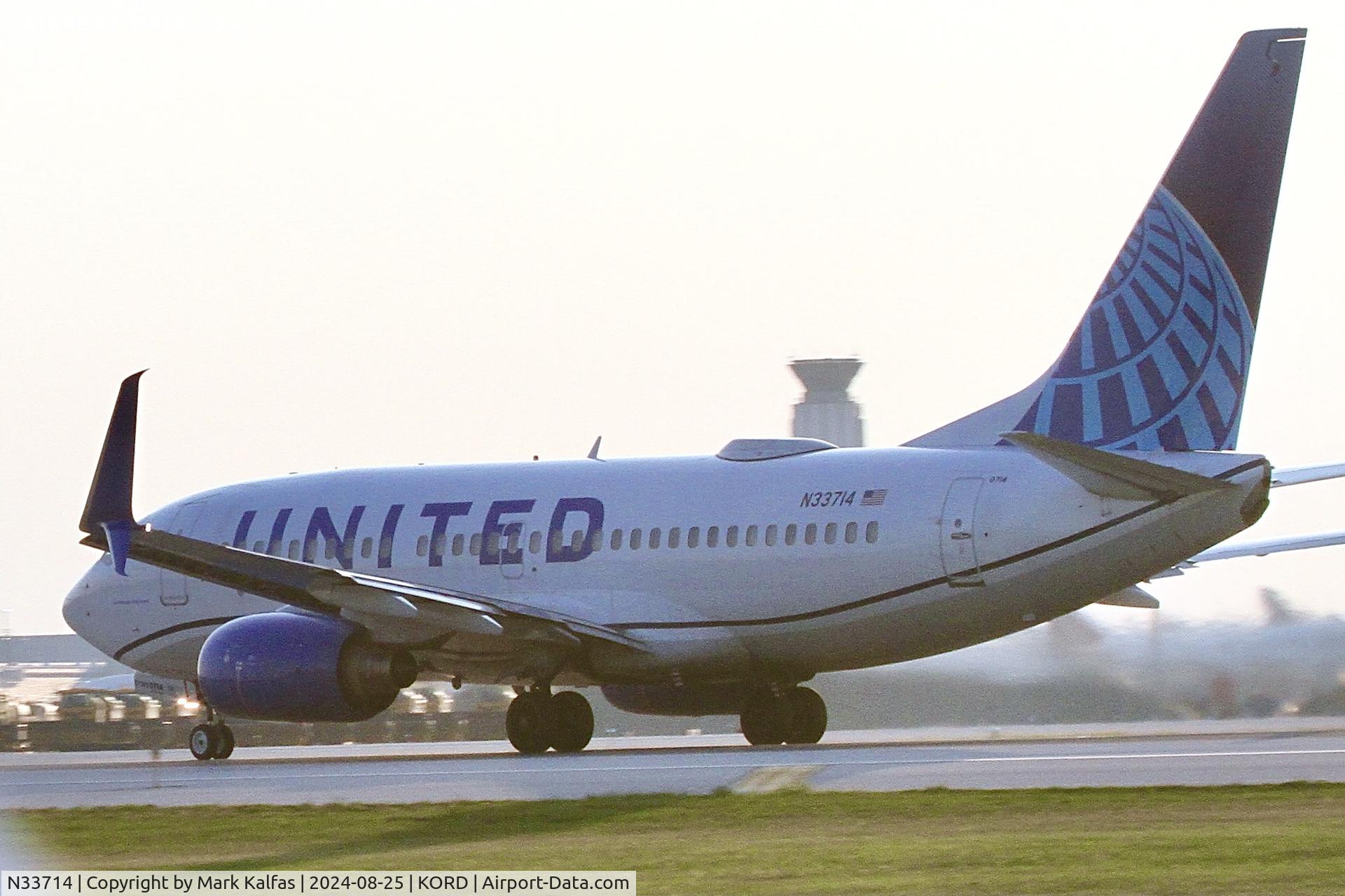 N33714, 1998 Boeing 737-724 C/N 28785, B737 United  Boeing 737-724 N33714 departing 22L ORD