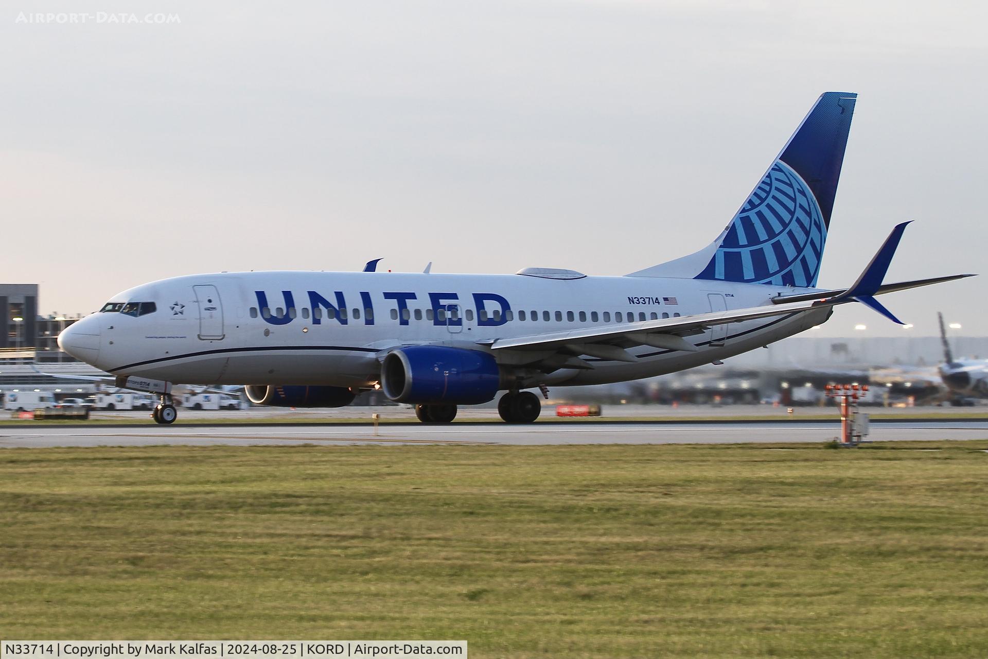 N33714, 1998 Boeing 737-724 C/N 28785, B737 United  Boeing 737-724 N33714 departing 22L ORD