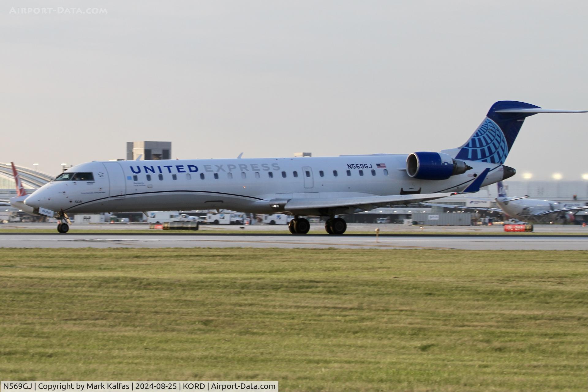 N569GJ, 2003 Bombardier CRJ-700 (CL-600-2C10) Regional Jet C/N 10109, CRJ7 GOJET / UNITED EXPRESS Canadair Regional Jet CRJ-550 N569GJ departing 22L ORD