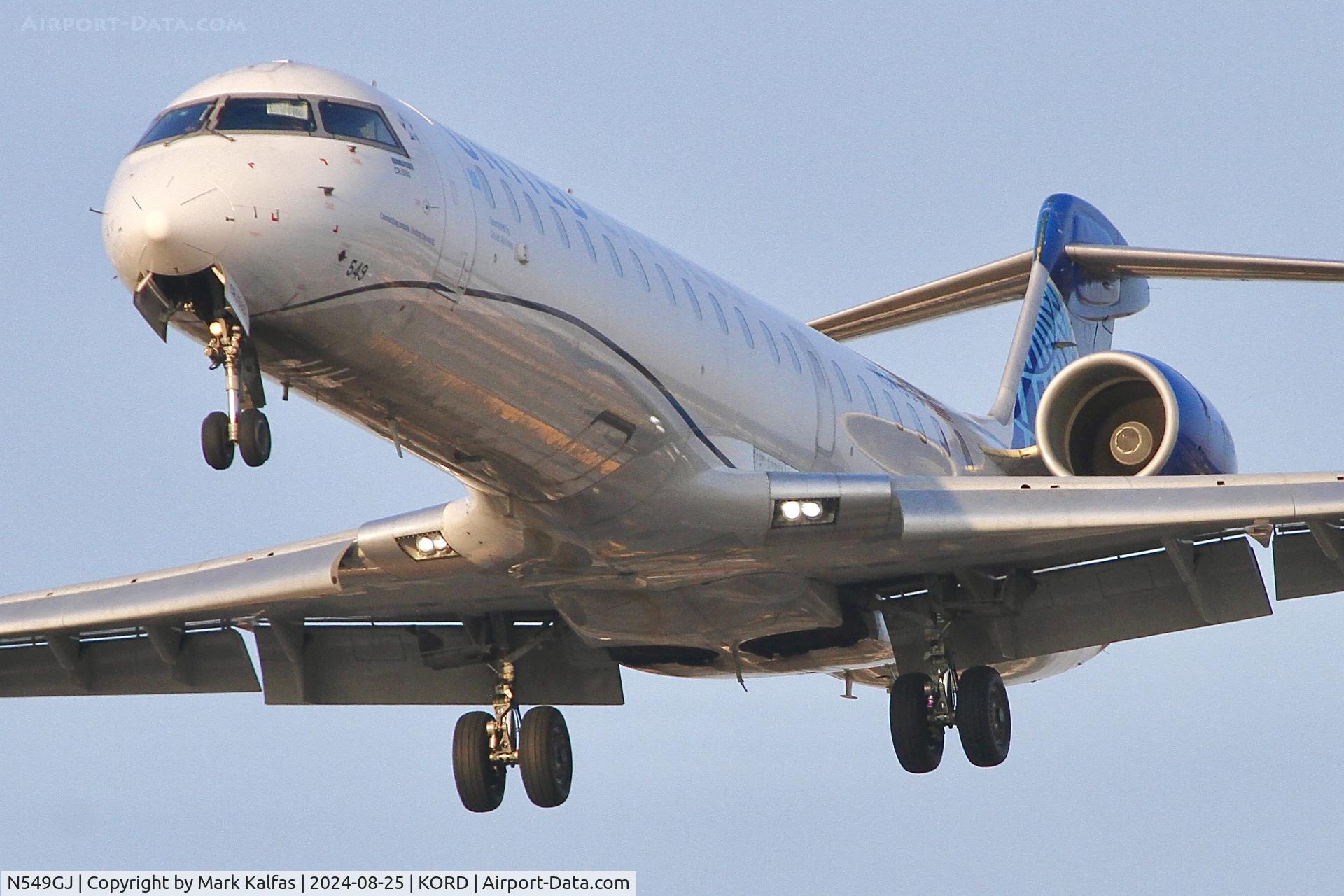 N549GJ, 2009 Bombardier CRJ-550 C/N 10280, CRJ7 GoJet/United Express Bombardier CRJ-701, CL-600-2C11 N549GJ arriving 28C ORD