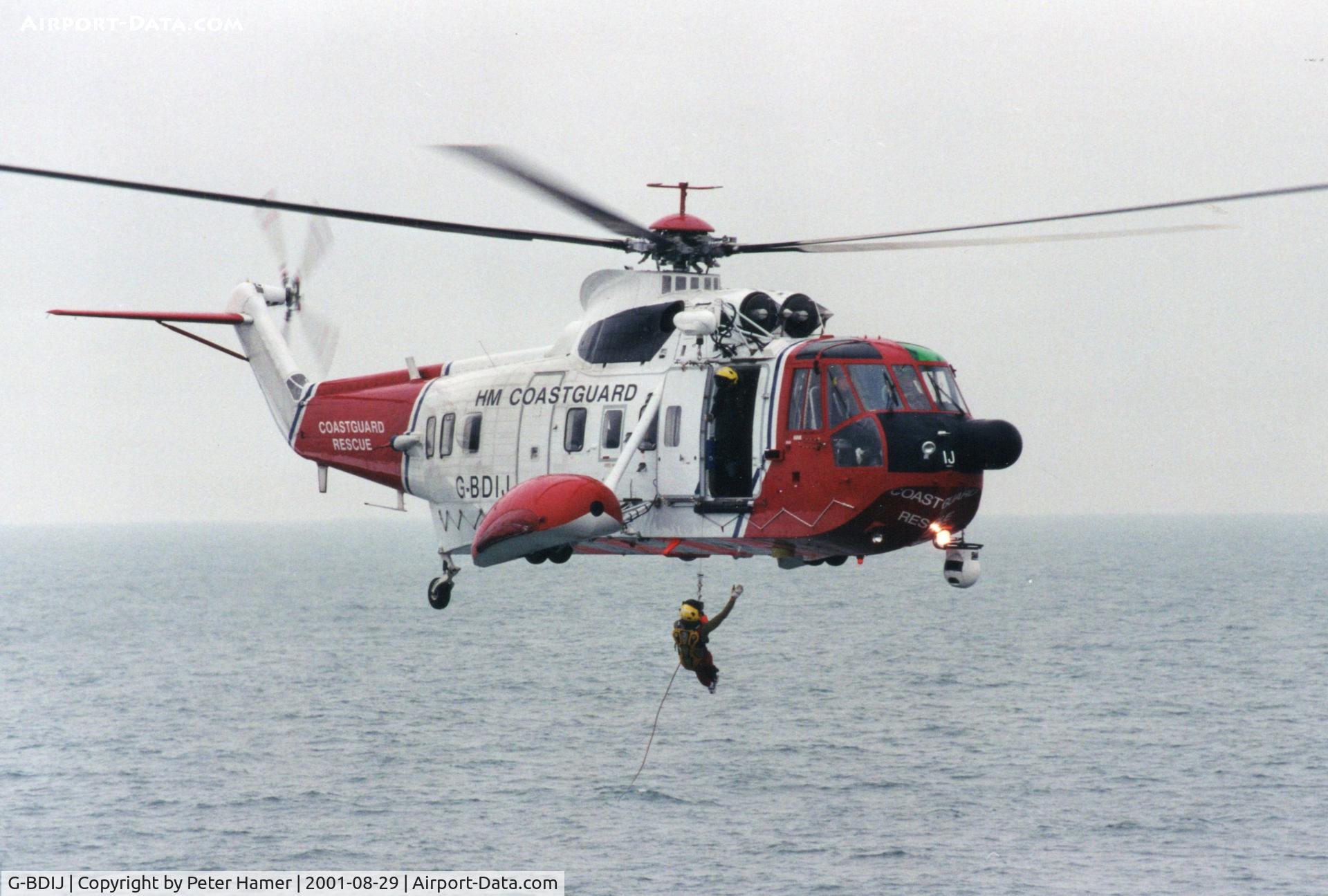 G-BDIJ, 1975 Sikorsky S-61N C/N 61751, Winching exercise near the Isle of Wight.