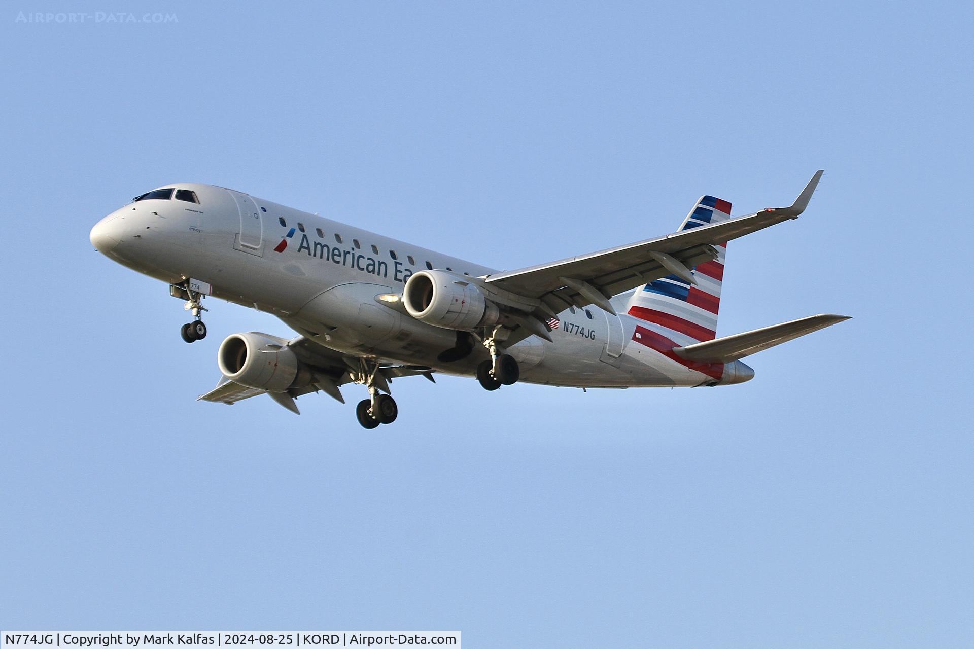 N774JG, 2004 Embraer 170SE (ERJ-170-100SE) C/N 17000007, E170 Envoy/ American Eagle EMBRAER ERJ 170-100 N774JG on approach 28C at ORD