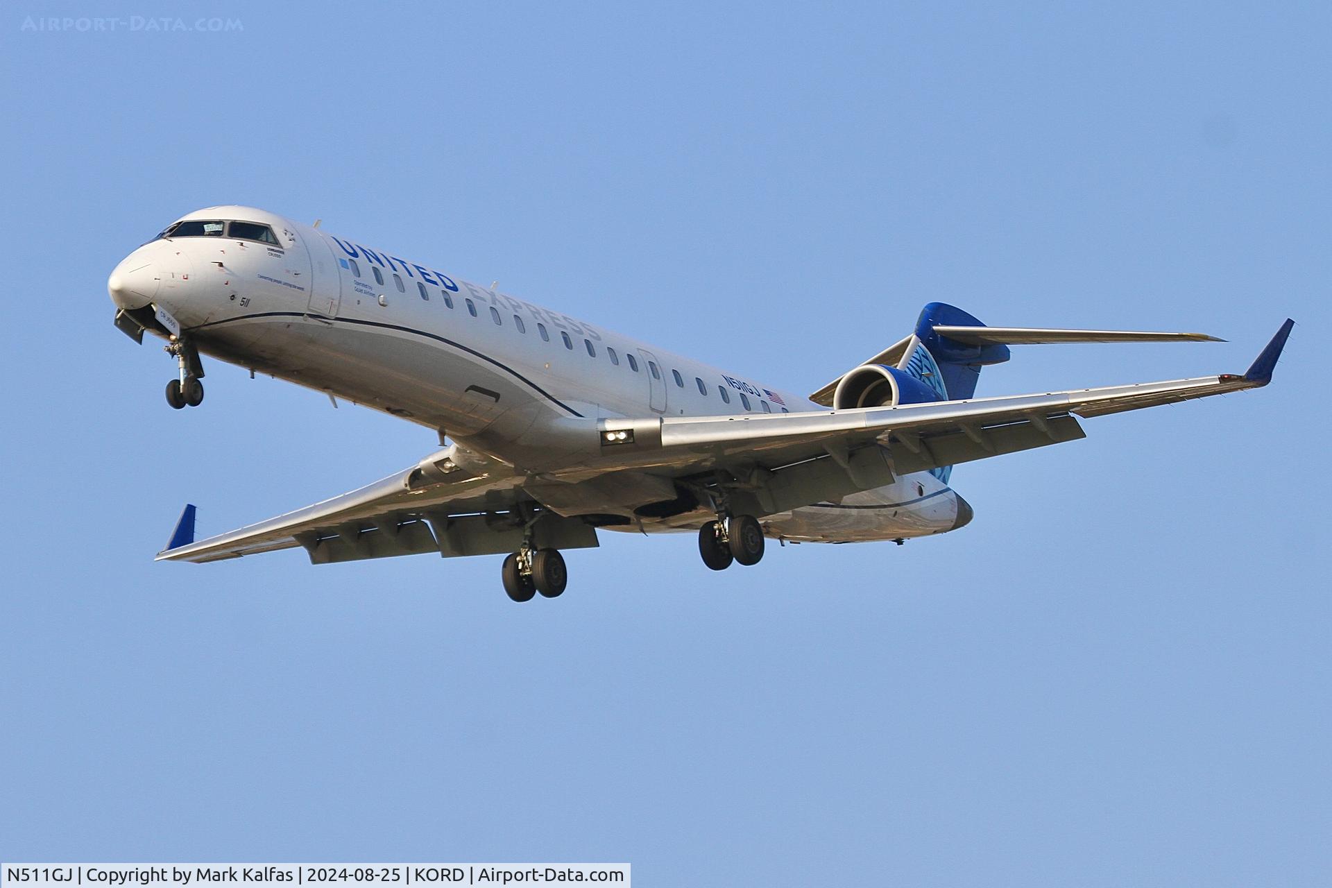 N511GJ, 2003 Bombardier CRJ-701 (CL-600-2C10) C/N 10128, CRJ7 GoJet / United Express Bombardier CRJ-550 N511GJ arriving 28C ORD
