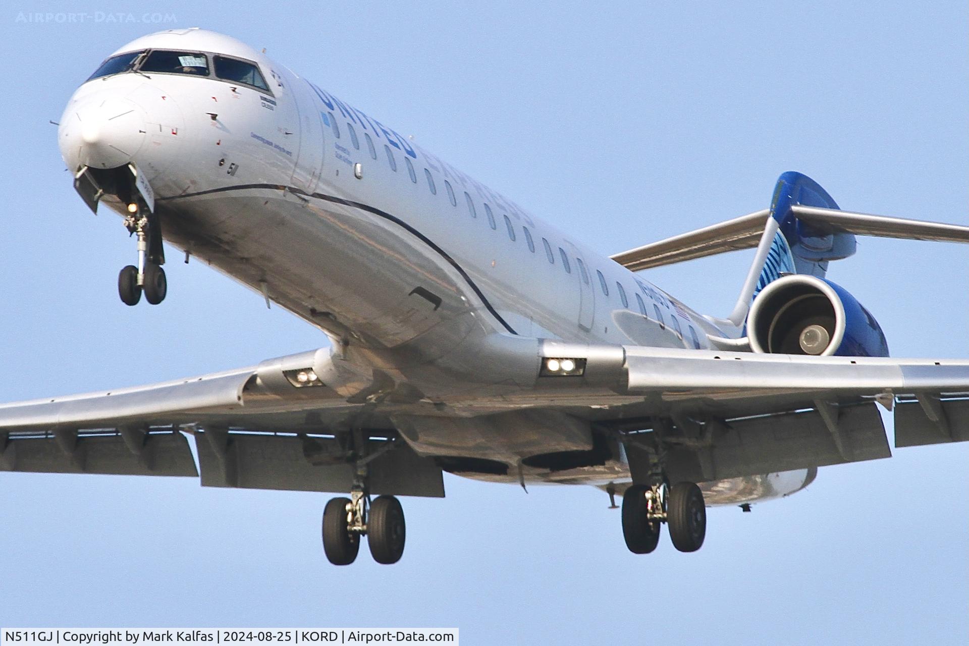 N511GJ, 2003 Bombardier CRJ-701 (CL-600-2C10) C/N 10128, CRJ7 GoJet / United Express Bombardier CRJ-550 N511GJ arriving 28C ORD