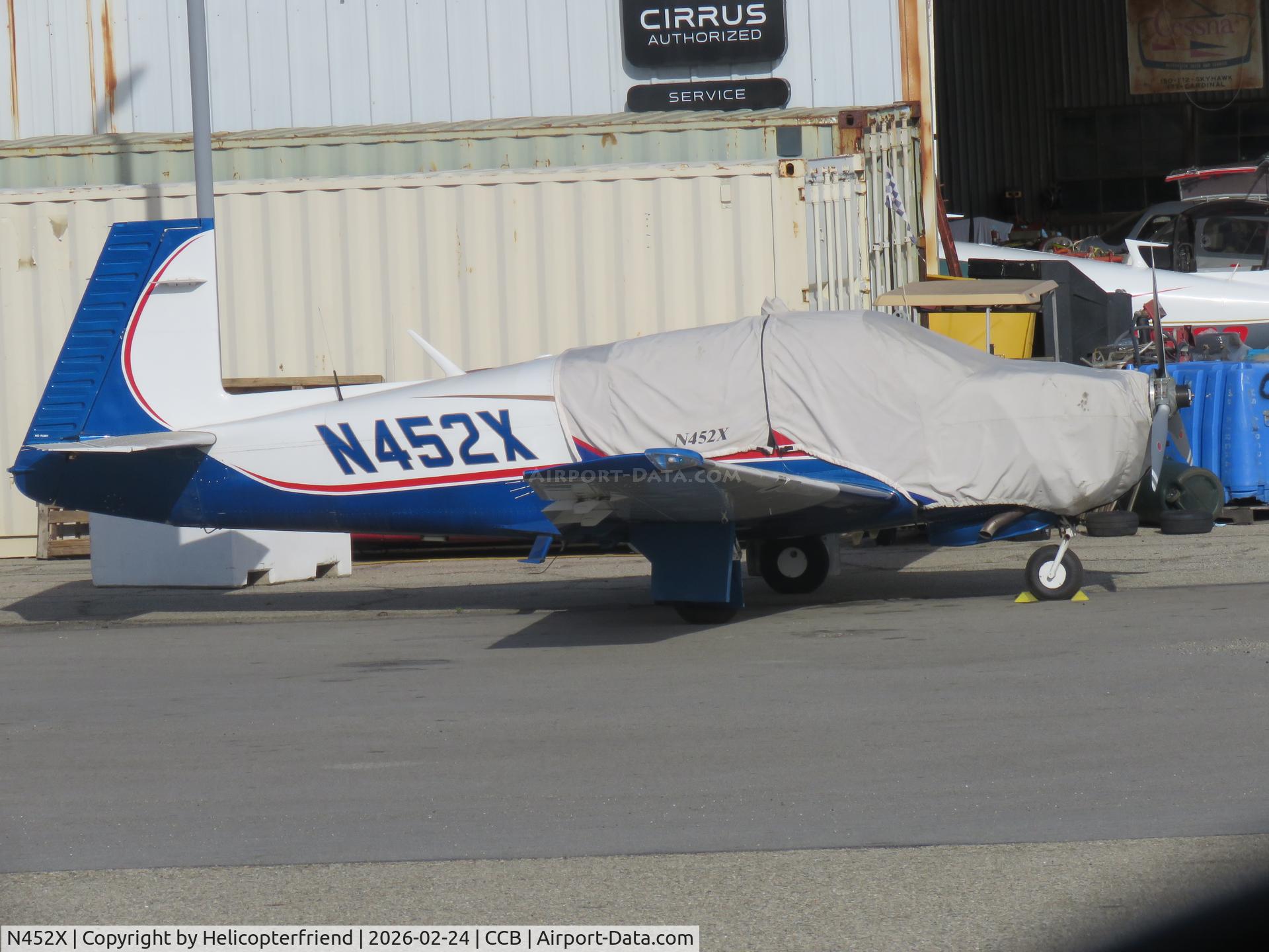 N452X, 1995 Mooney M20J 201 C/N 24-3357, Parked next to mechanic's shop