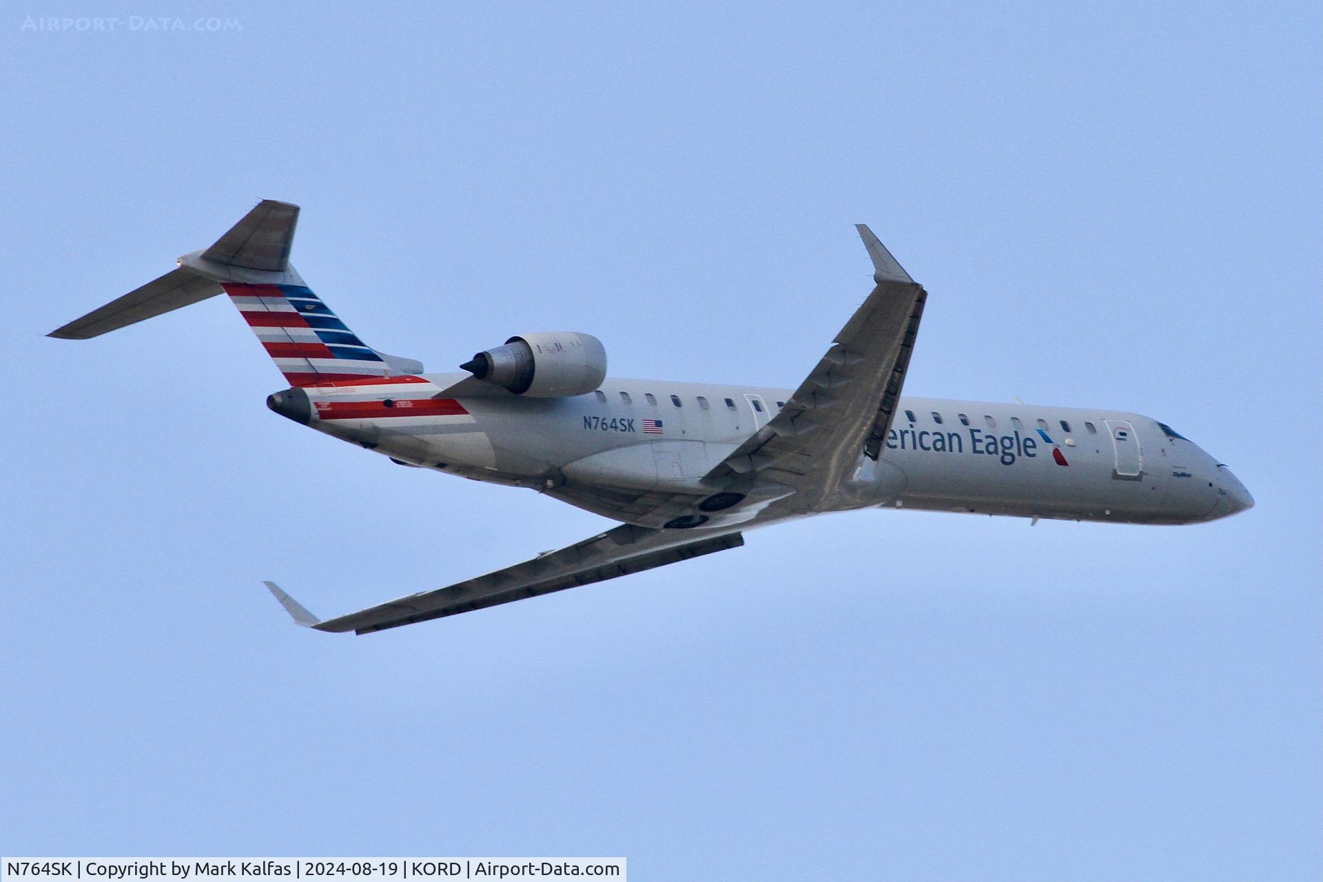 N764SK, 2005 Canadair CRJ-700 (CL-600-2C10) Regional Jet C/N 10229, CRJ7 SkyWest / American Eagle Canadair Regional Jet CRJ-700 N764SK departing 10L KORD