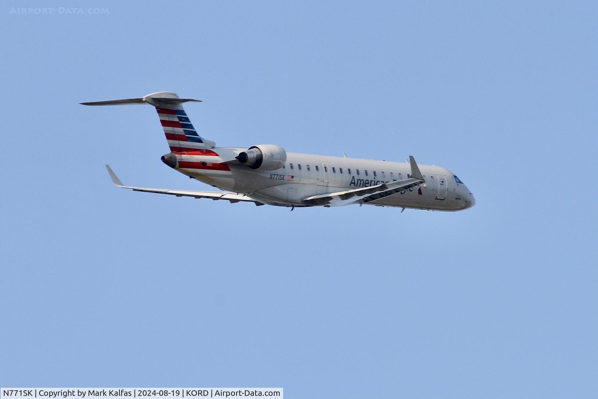 N771SK, 2006 Bombardier CRJ-700 (CL-600-2C10) Regional Jet C/N 10244, CRJ7 SkyWest/American Eagle  Bombardier CRJ-700 N771SK departing 10L KORD
