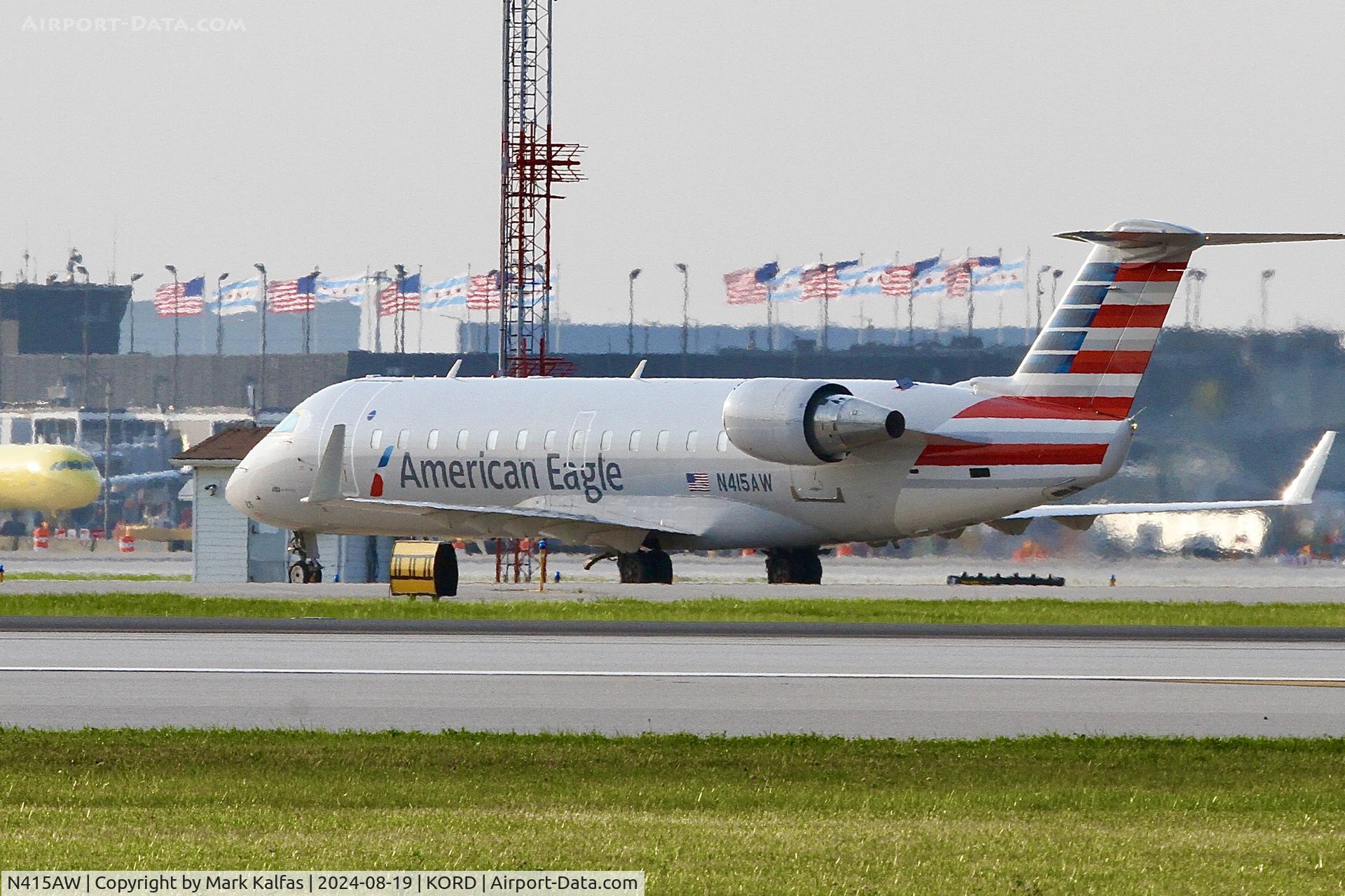 N415AW, 2001 Bombardier CRJ-200LR (CL-600-2B19) C/N 7593, CRJ2 AirWisconsin / American Eagle Bombardier CRJ-200LR  N415Aw arriving KORD