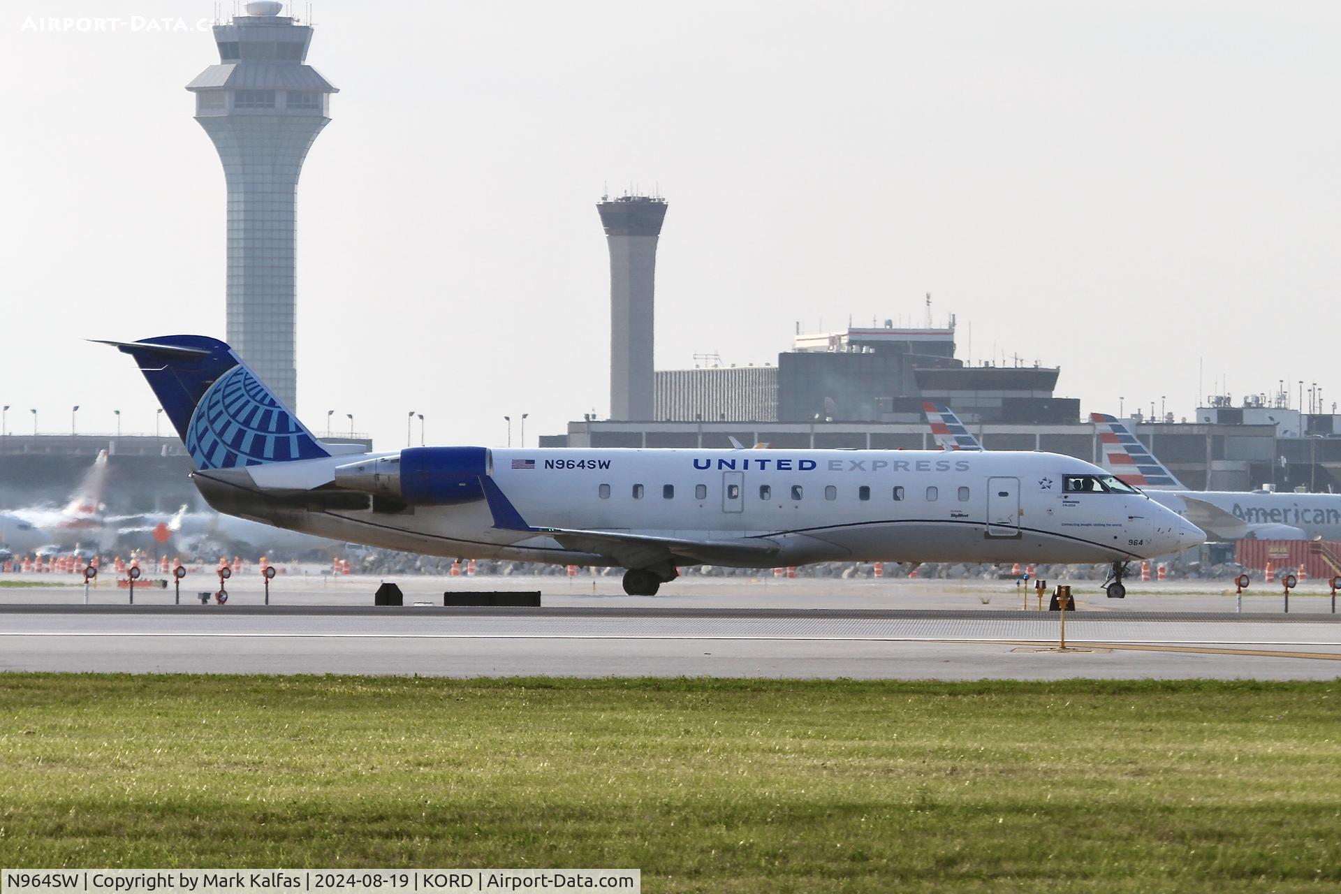 N964SW, 2003 Bombardier CRJ-200ER (CL-600-2B19) C/N 7868, CRJ2 SkyWest/United Express Bombardier CL-600-2B19 N964SW arriving at O'HARE