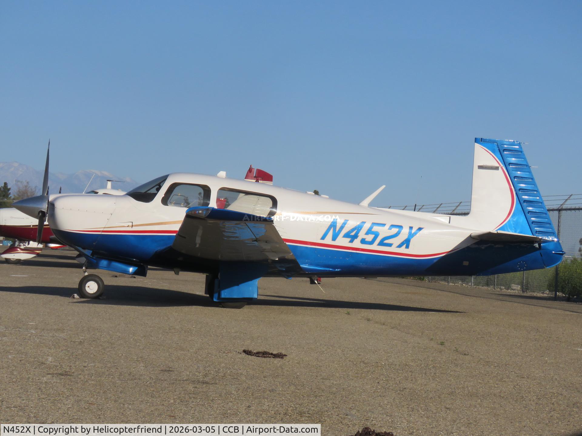 N452X, 1995 Mooney M20J 201 C/N 24-3357, Parked by south fence