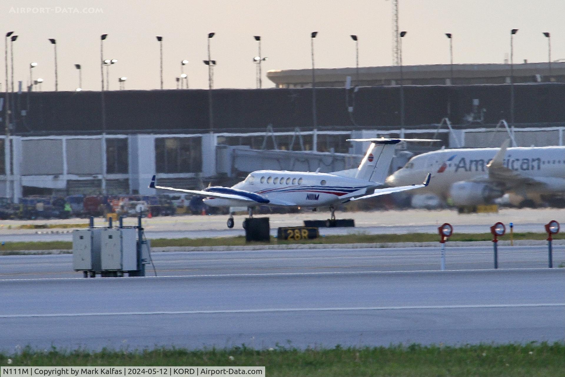 N111M, 1998 Beech B300 350 King Air C/N FL-210, B350 INGRAM INDUSTRIES INC Beech B300 350 King Air N111M departing 28R KORD