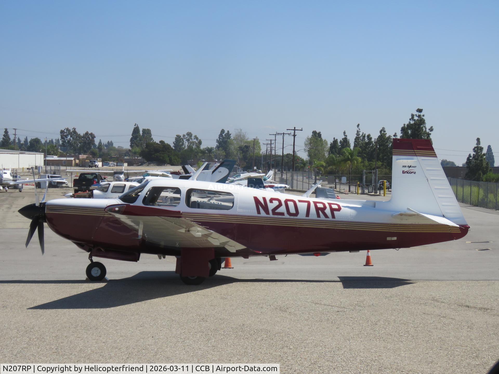 N207RP, 1997 Mooney M20K C/N 25-2009, Parked in mechanic's parking area