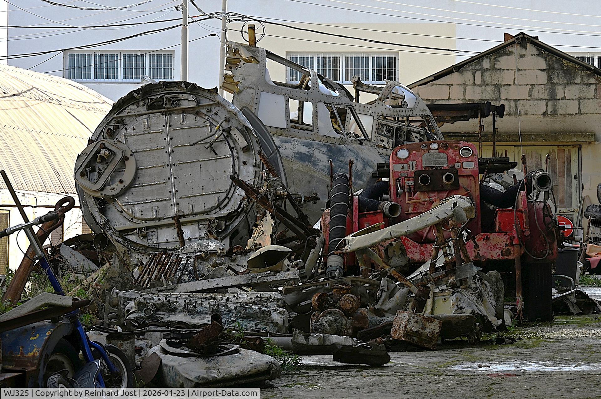 WJ325, 1952 Handley Page Hastings C.4 C/N HP94-3, Nose of ex-RAF Hastings C. Mk4 WJ325 in the backyard of the Malta Aviation Museum with another Hastings-nose (WJ328) in the background. The plane was scrapped at Luqa / Malta in 1969.