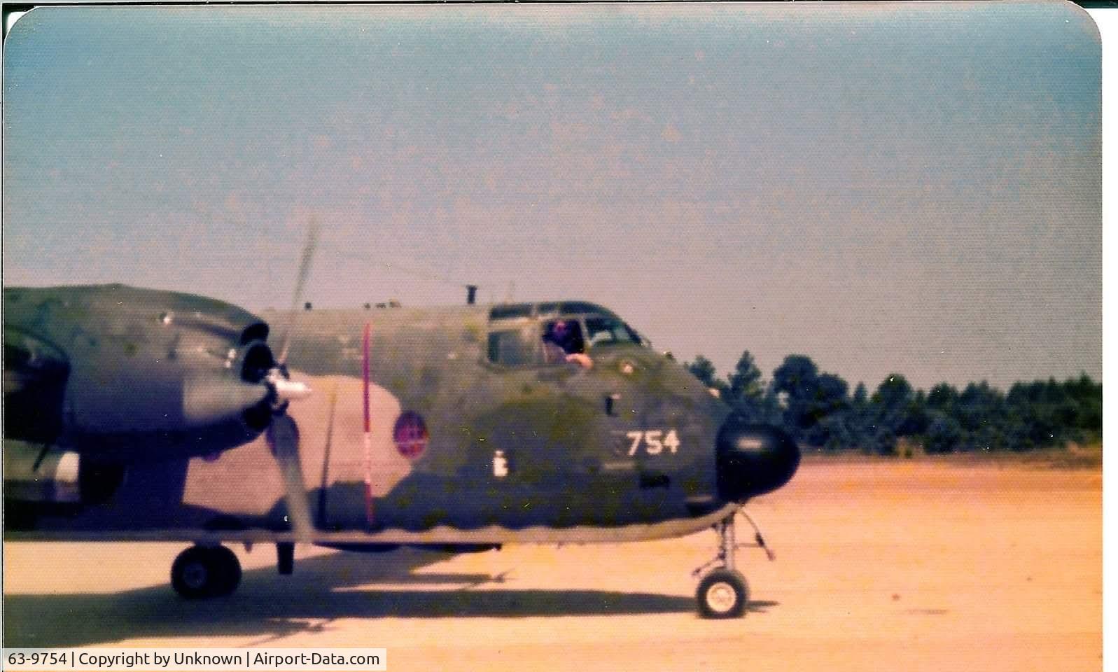 63-9754, 1964 De Havilland Canada C-7A Caribou C/N 215, Air Force Reserve bird either 700th TAS or 357 TAS.  Timeframe is late 70s or Very Early 80s.  Arriving to pick up Army Paratroopers for a Jump.