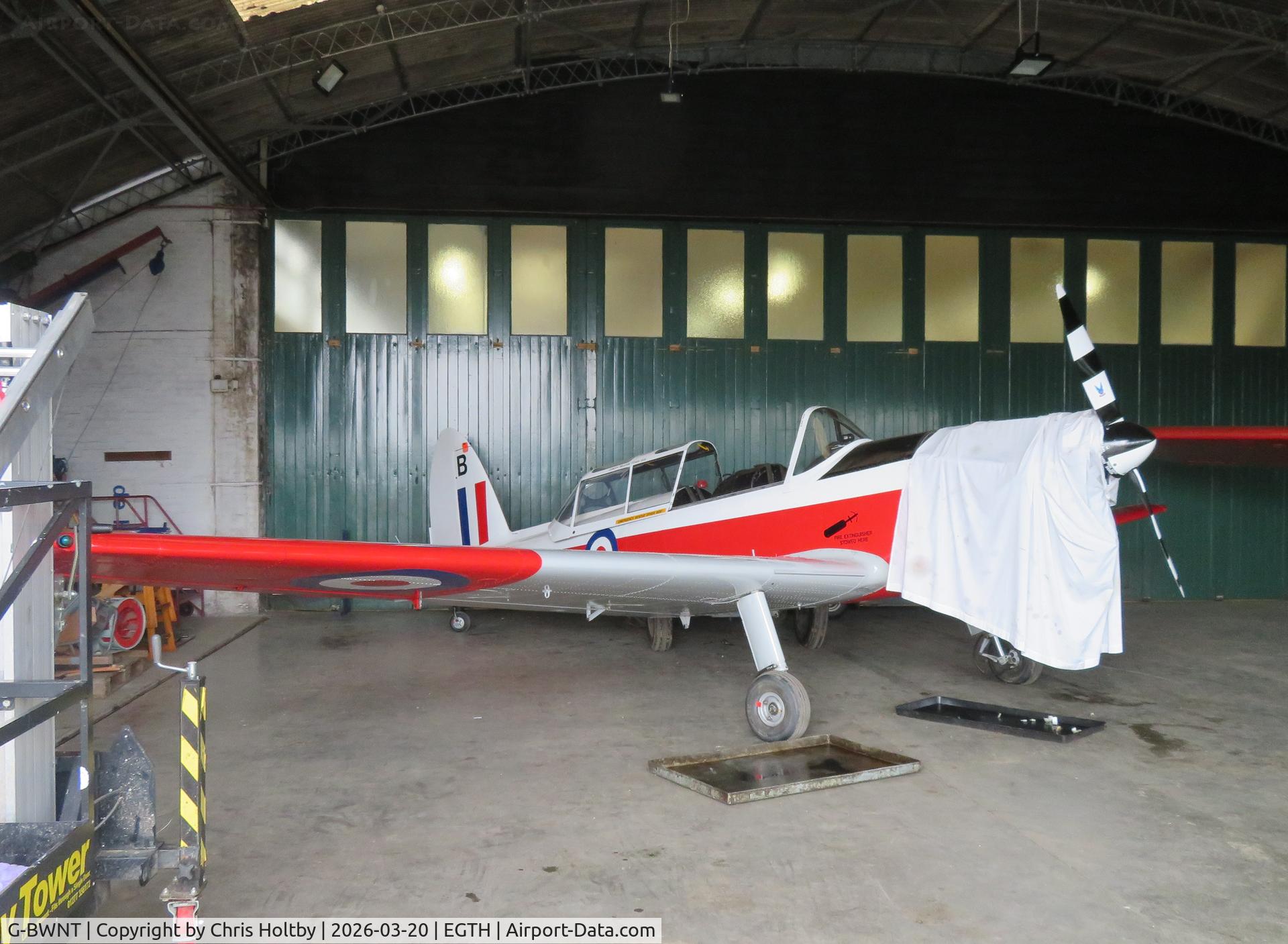 G-BWNT, 1952 De Havilland DHC-1 Chipmunk T.10 C/N C1/0772, Parked in the maintenance hangar at Old Warden (EGTH)