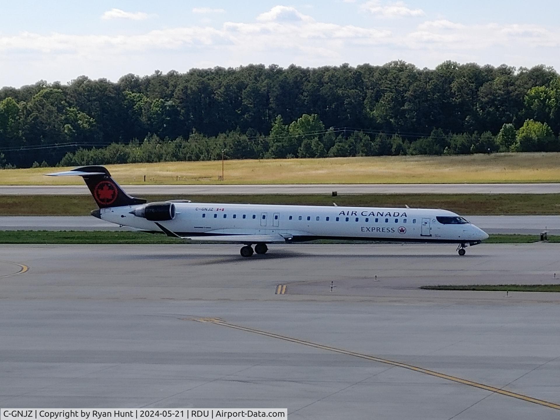 C-GNJZ, 2005 Canadair CRJ-900 (CL-600-2D15) C/N 15052, When I heard that this plane crashed, I went to check my devices to see if I had photographed it. Sure enough, I did. RIP to the two flight crew who perished.