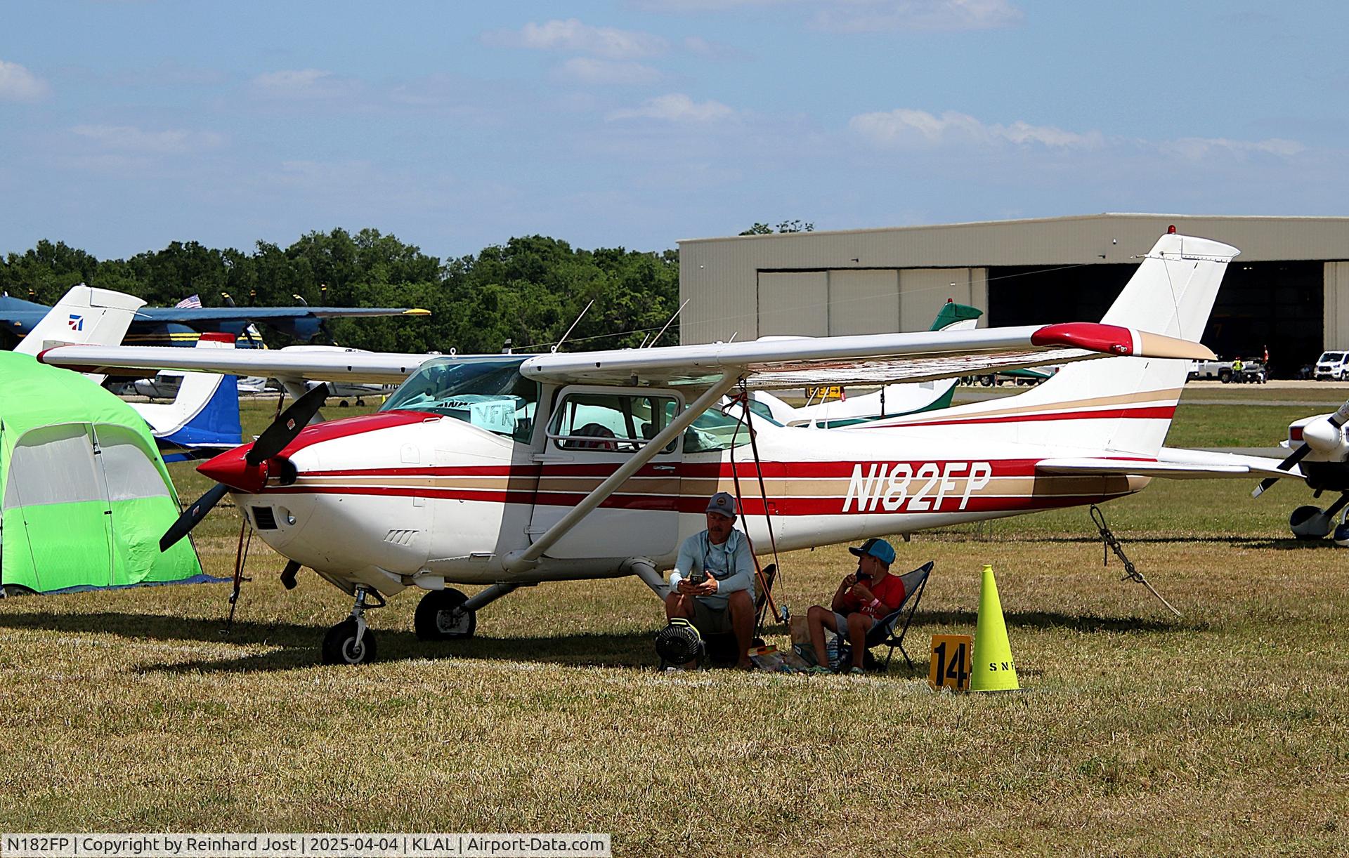 N182FP, 1976 Cessna 182P Skylane C/N 18265008, Skylane giving sun protection at Sun'n'Fun 2025 at Lakeland, FL