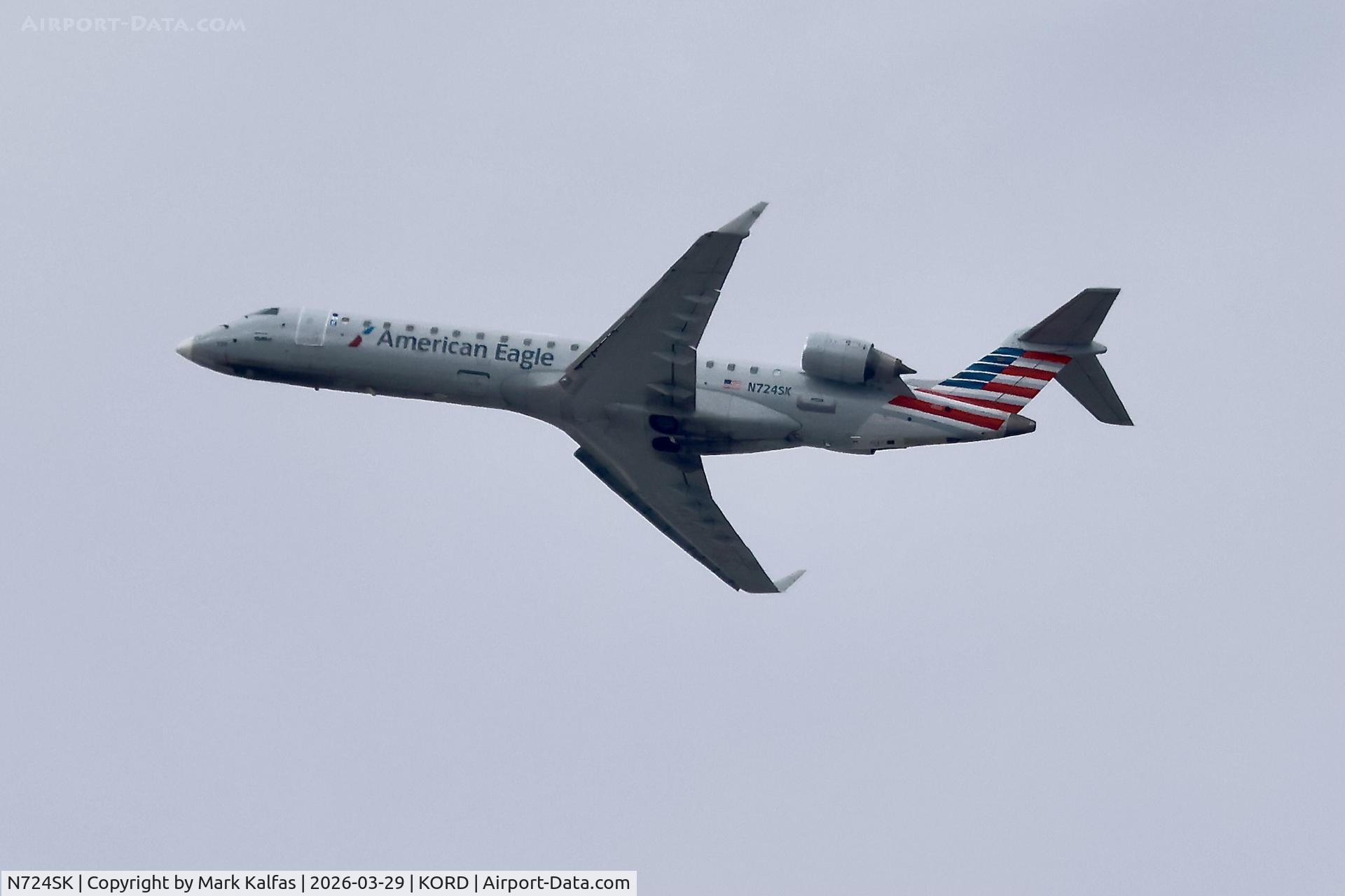 N724SK, 2004 Bombardier CRJ-700 (CL-600-2C10) Regional Jet C/N 10189, CRJ7 SkyWest / American Eagle Bombardier CRJ-700 N724SK departing 28R KORD