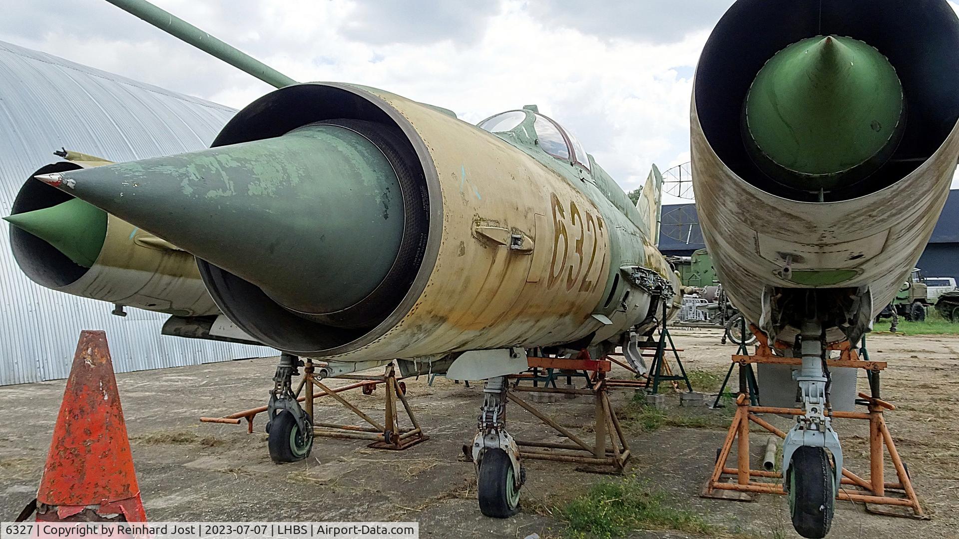 6327, 1977 Mikoyan-Gurevich MiG-21bis 75AP C/N 75046327, Fuselage of Hungarian AF MiG-21bis-75AP 6327 amongst others in the military aircraft collection at Budaörs Aerodrome near Budapest, Hungary