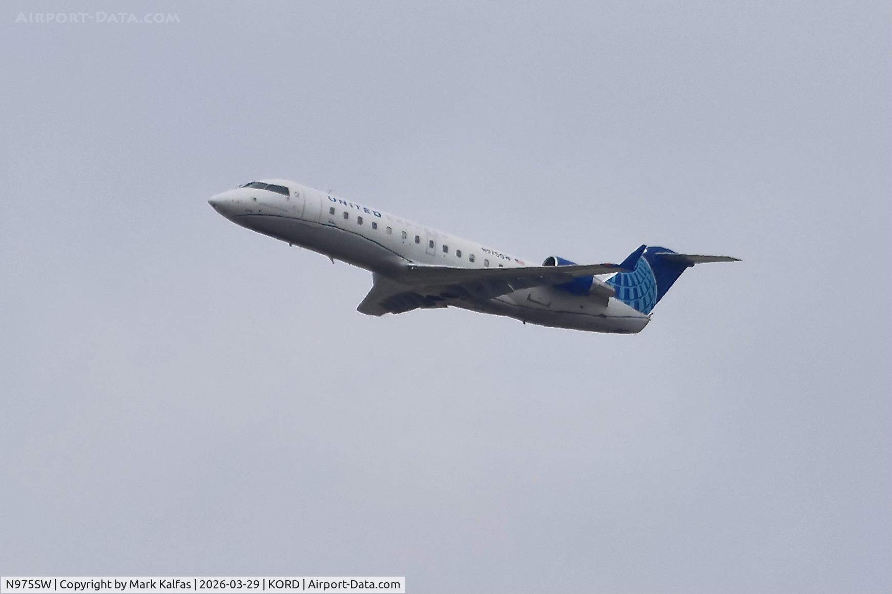 N975SW, 2004 Bombardier CRJ-200ER (CL-600-2B19) C/N 7951, CRJ2 SkwWest /United Express Canadair Regional Jet CRJ-200 N978SW departing 27L KORD