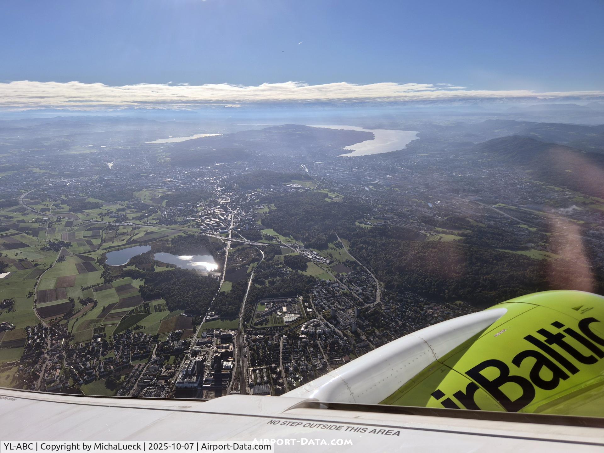 YL-ABC, 2021 Airbus A220-300 C/N 55127, Climbing out of ZRH