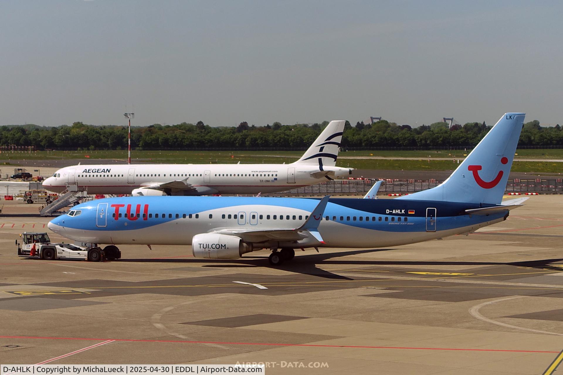 D-AHLK, 2008 Boeing 737-8K5 C/N 35143, SX-DNH in the background