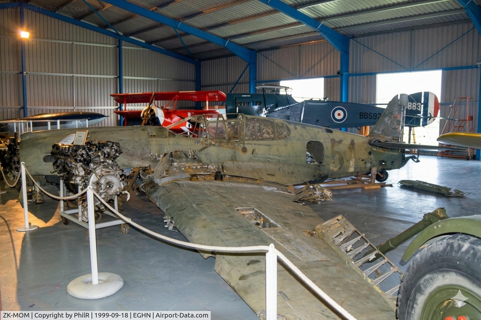 ZK-MOM, 1941 Curtiss P-40E Kittyhawk C/N 16786, 41-13570 1941 Curtis P-40E Warhawk USAAC Front Line Aviation Museum Sandown 