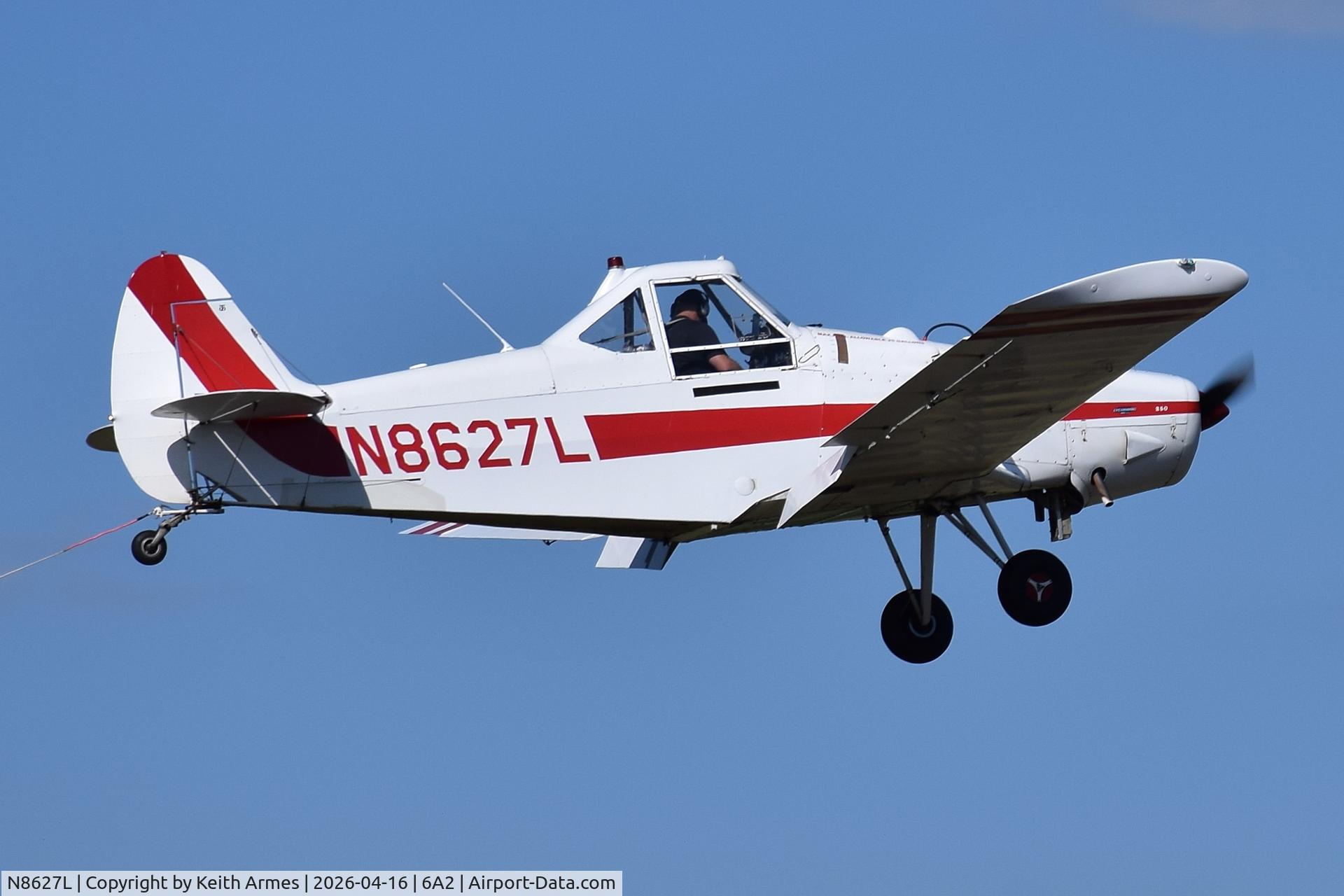 N8627L, 1969 Piper PA-25-260 Pawnee B C/N 25-5060, Pulling banner just after take-off from Griffing Spalding Airport (6A2)