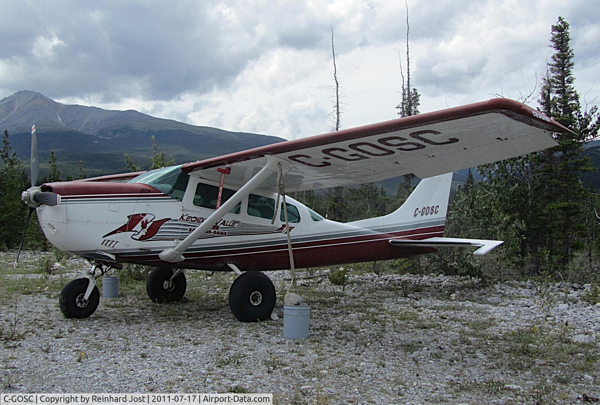 C-GOSC, 1977 Cessna U206G Stationair C/N U20603757, Kechika Valley Air Stationair 6 at a dusty airstrip near Muncho Lake, BC